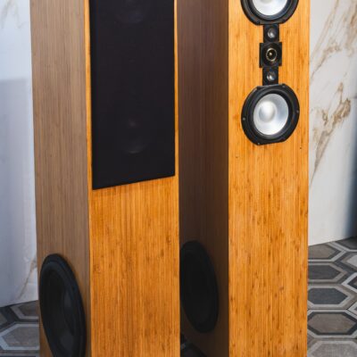Pair of Bache Audio SOFIA-105 bamboo floorstanding speakers with one grille fitted